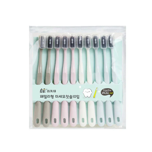 Close-up of the soft, dark bristles on one of the adult bamboo charcoal toothbrushes from the multi-pack.